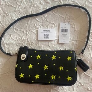 Coach cosmic star black Penn shoulder bag